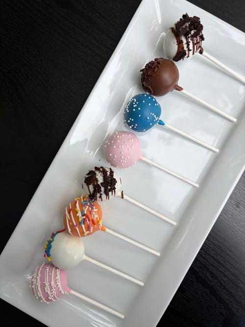 Variety cake pops with basic decor